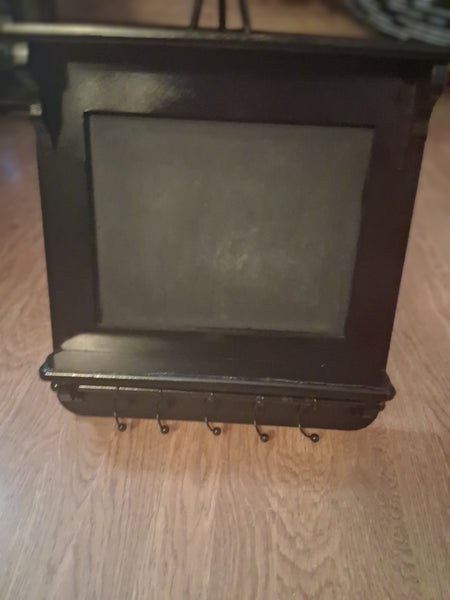 Black Shelf with Hooks and Chalkboard
