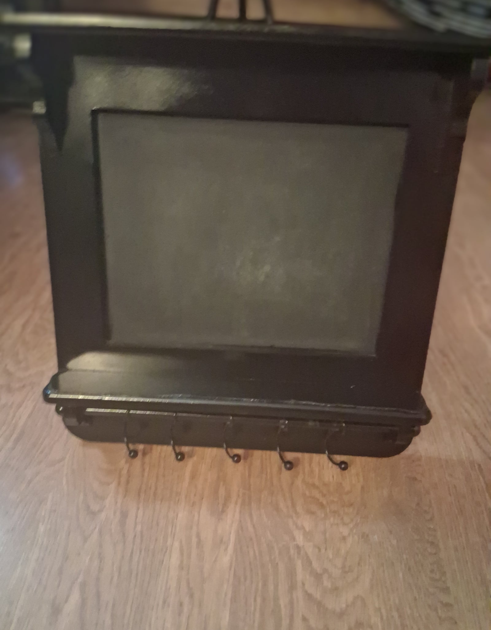 Black Shelf with Hooks and Chalkboard